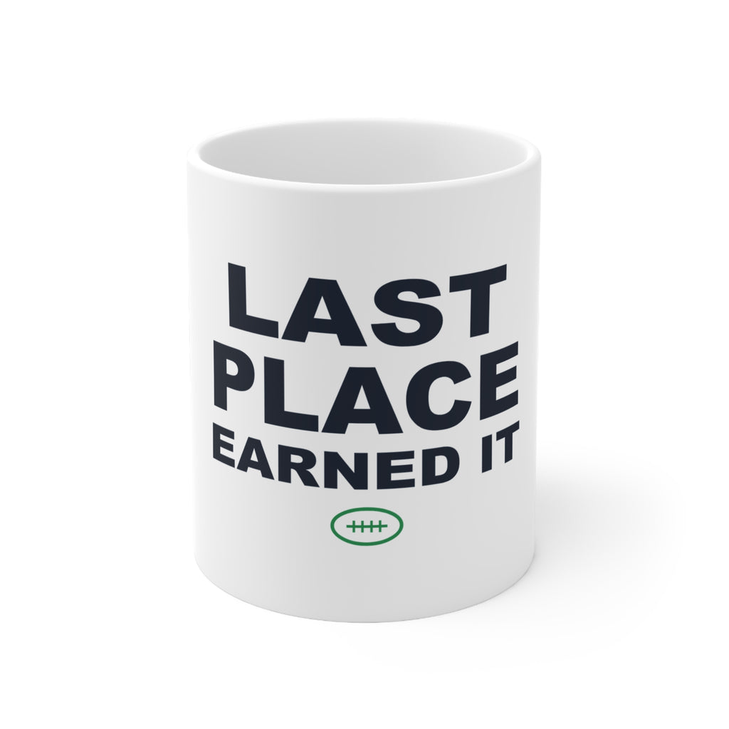 Last Place Earned It White Mug